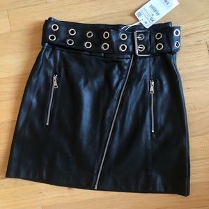 Faux leather mini skirt with eyelet belt